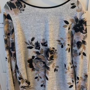 Long sleeve grey and black top.